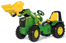 žlutý traktor s čelním nakladačem